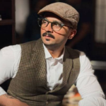 Rajab Butt Teases Mystery Project With Bold New Vintage-Inspired Look